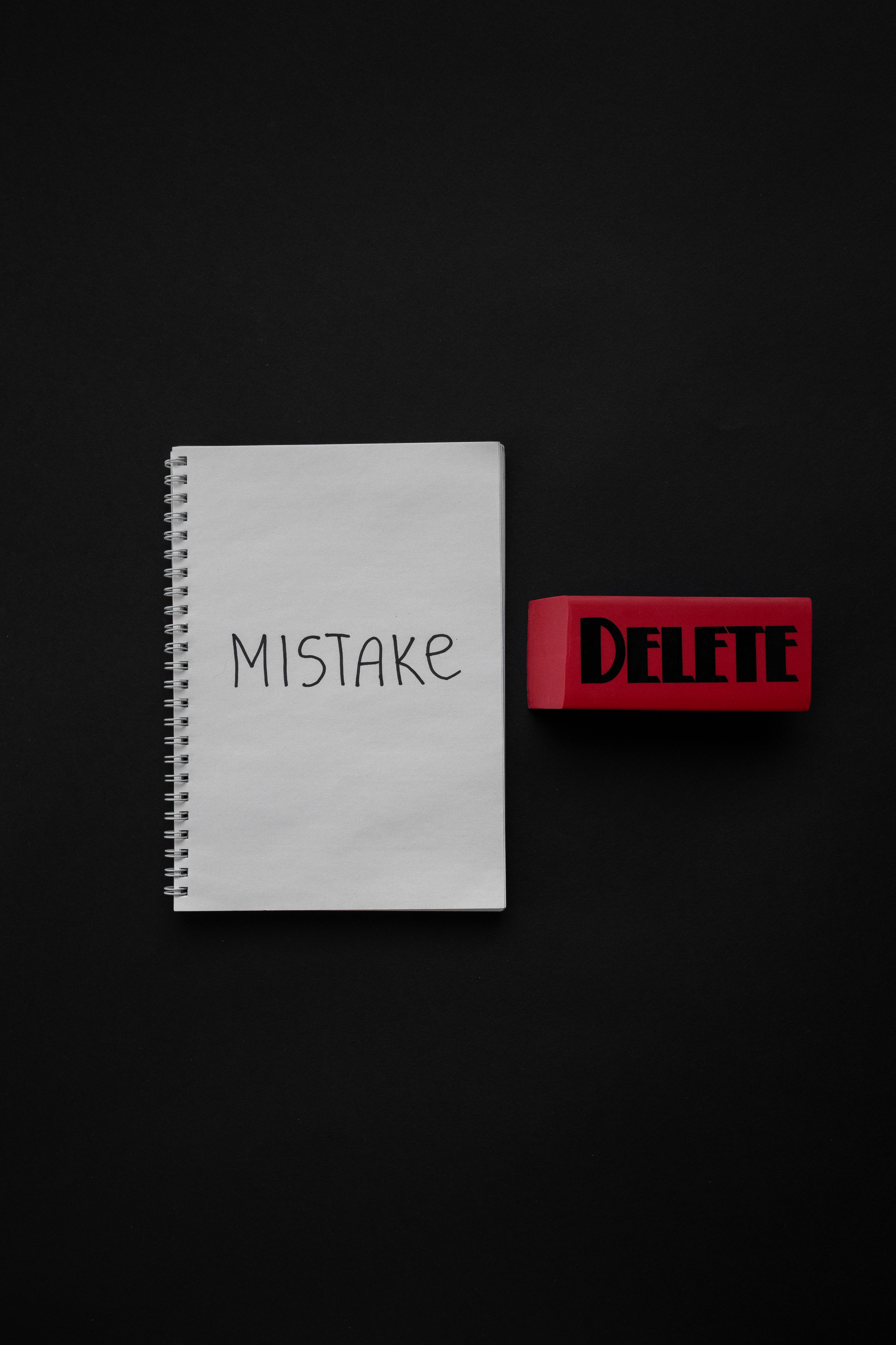 Free Mistake Written on a Notebook Stock Photo